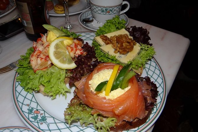 A Well Balanced History and Food Tour with Focus on the Scandinavian Kitchen - Walking through Aker Brygge and the waterfront