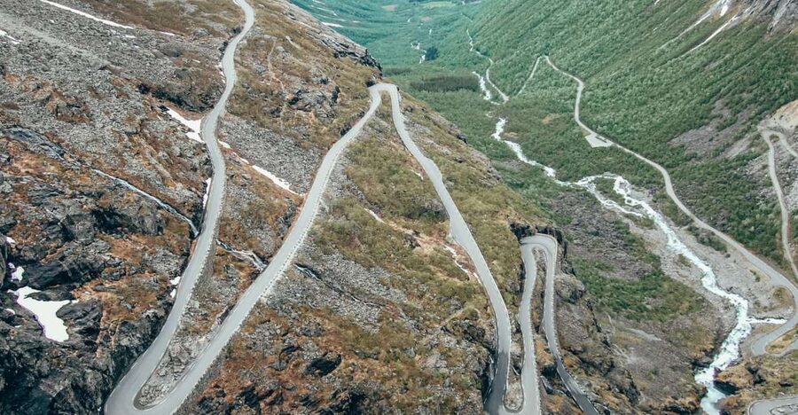 From Ålesund: Trollstigen Sightseeing Village & Fjord Tour - Starting at the orange building on Prestebrygga