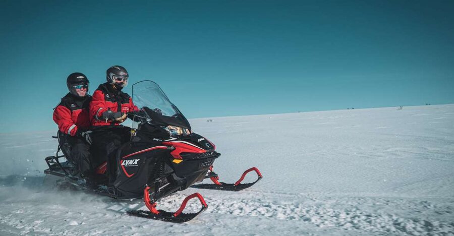 From Alta: Daytime Snowmobile Adventure - From Alta to a 150-year-old mountain lodge
