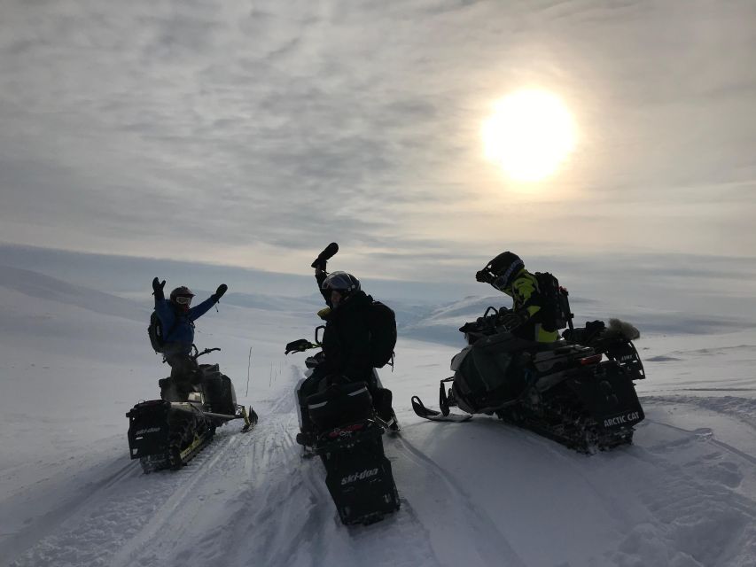 From Tromso: Arctic Wilderness Snowmobile Daytime Tour - A controlled ride through snowy valleys
