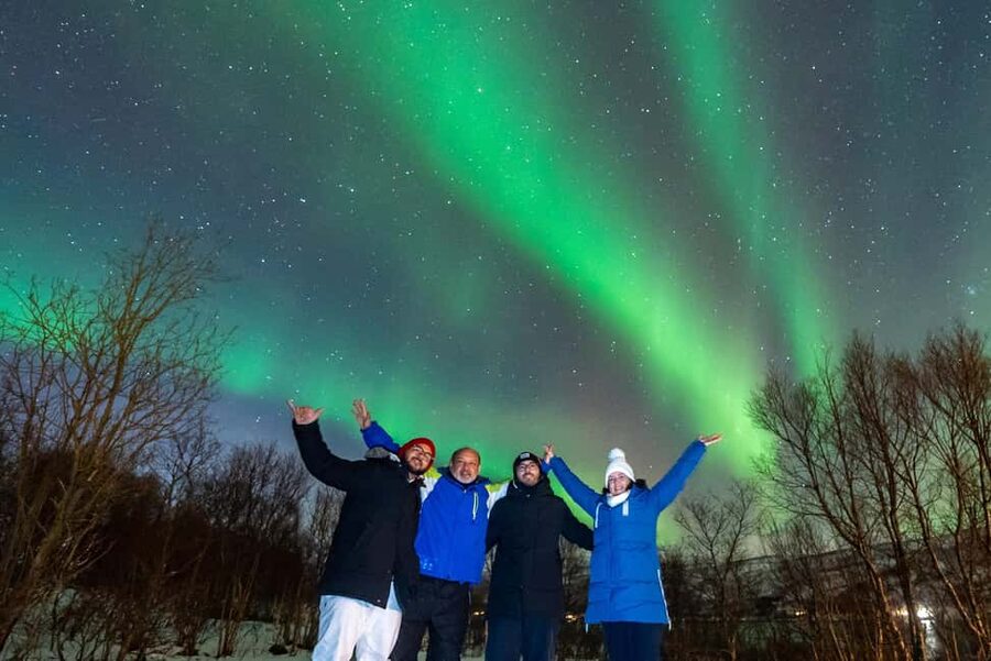 From Tromsø: Aurora Minibus Chase with Portrait and Hot Meal - Following the cloud map