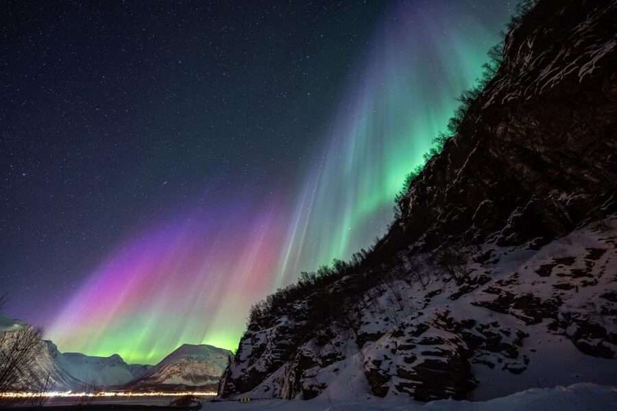 From Tromsø: Aurora Minibus Chase with Portrait and Hot Meal - The camp: fire, food, and a heated toilet