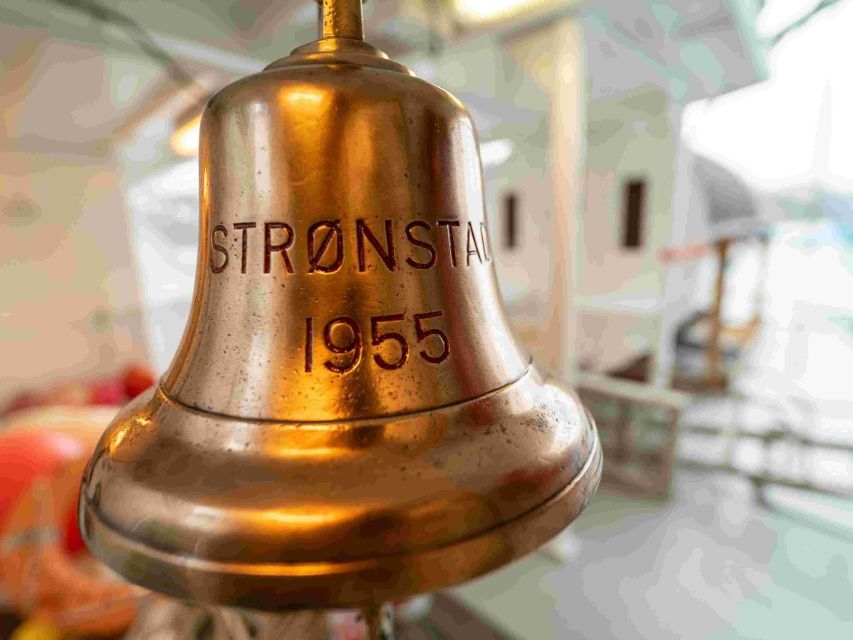 From Tromsø: Northern Lights Cruise on a Cozy Vintage Vessel - Meeting the captain and exploring the working vessel