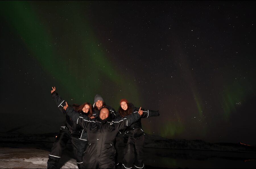 From Tromsø: Northern Lights Tour in Minibus with Photos - Thermal suits, spikes, and the outdoor wait
