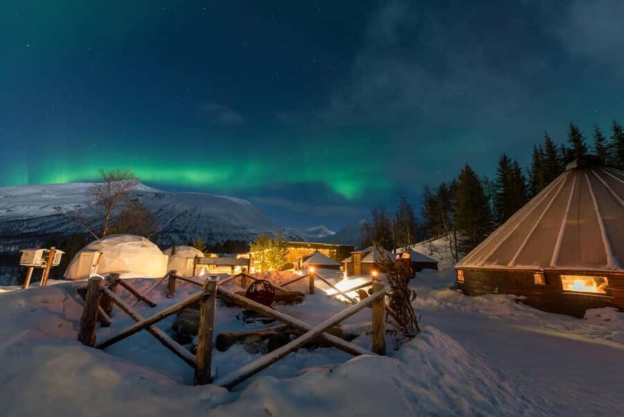 From Tromsø: Northern Lights Visit at Camp Tamok - Getting fitted for Arctic clothing