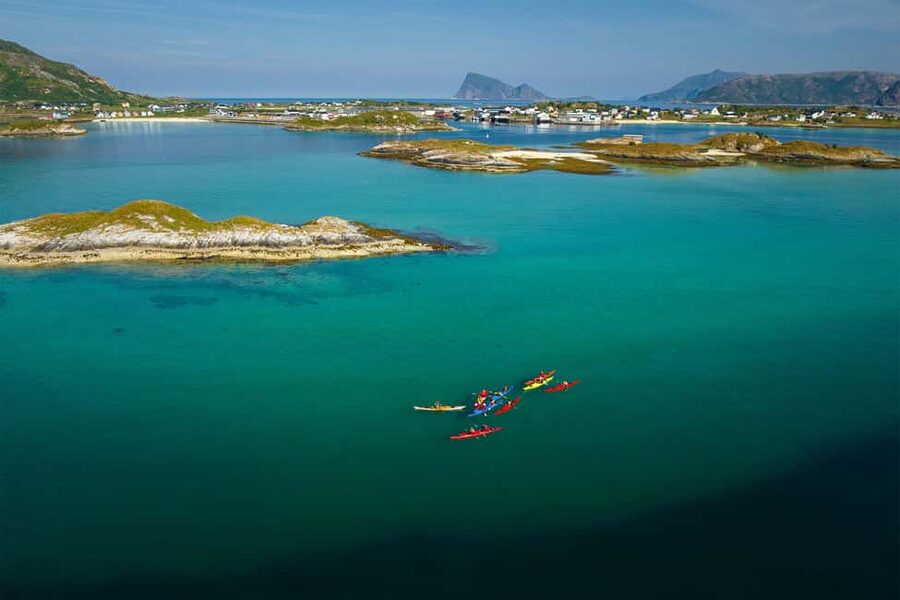 From Tromsø: Sea Kayaking Tour at Sommarøy with Transfer - Getting suited up in a cold-water drysuit