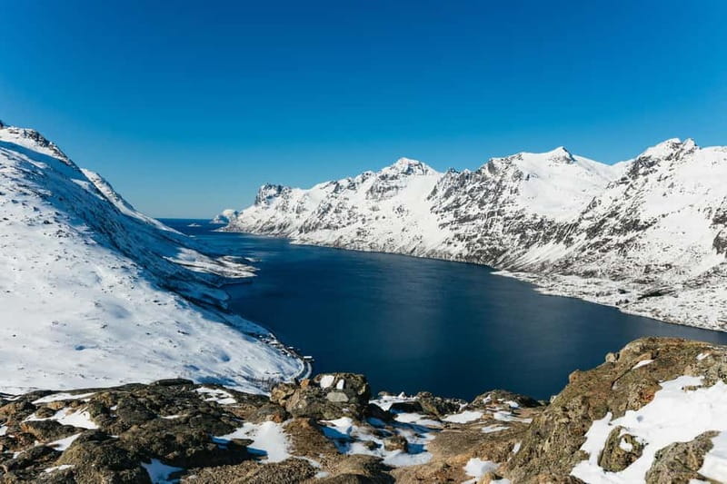 From Tromsø: Snowshoeing Hike with Picnic Lunch and Photos - Mountain and fjord views on the climb