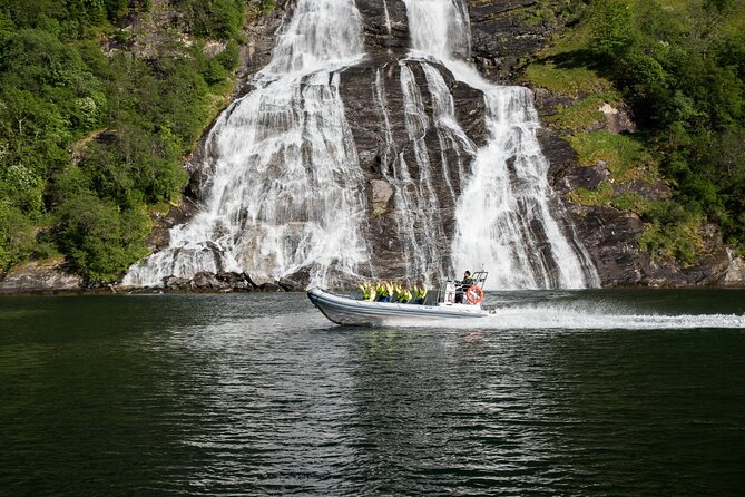Geiranger: RIB Fjordsafari Geirangefjord - Friaren and the stories carved into the cliffs