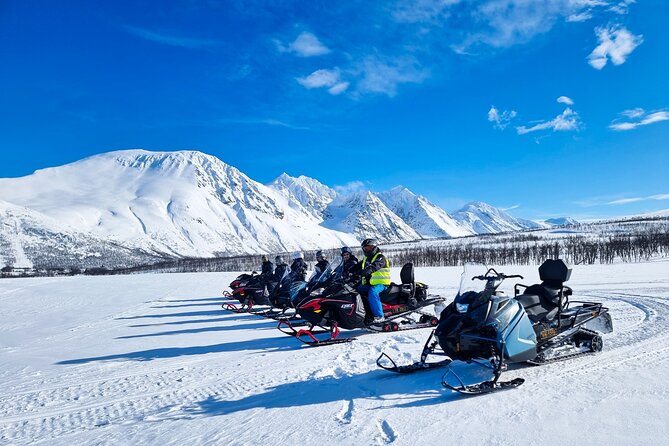 Guided Lyngen Alps Snowmobile Tour From Tromso - Riding the approved trails through the mountains