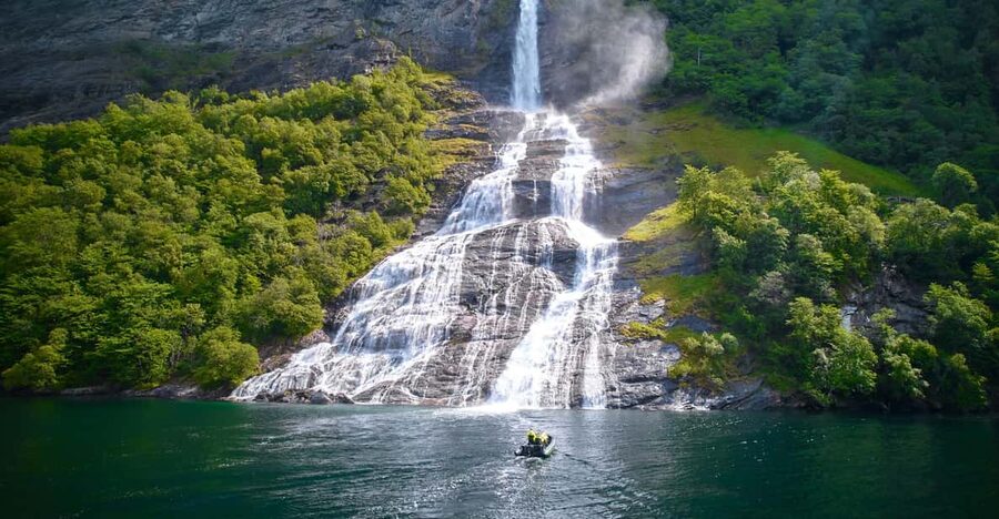 Hellesylt: Guided Geirangerfjord Boat Tour - Crossing toward the famous waterfalls