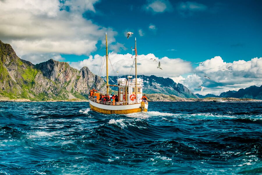 Lofoten: Traditional Fishing Trip - Learning to fillet fish on board