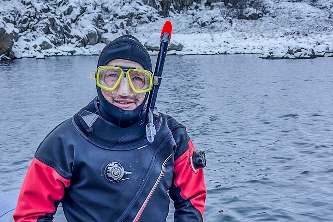 Lofoten Unique Snorkeling Experience in Dry Suit - Warming up with coffee or tea