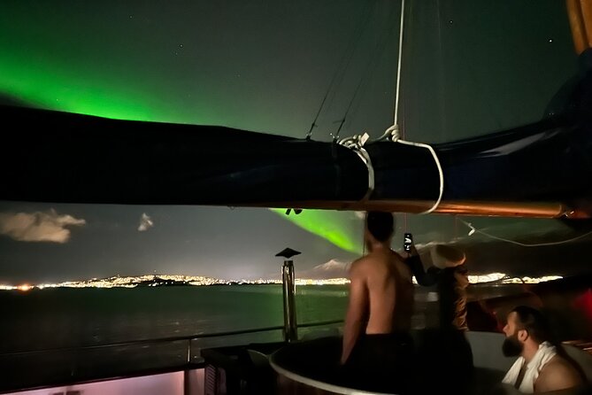 Luxury Northern Lights Yacht Cruise with Hot Tub from Tromsø - Four hours of fjords, sky, and changing weather