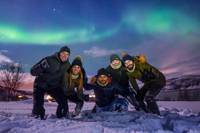 Northern Lights Tour from Tromsø - Taking home photos of you beneath the lights