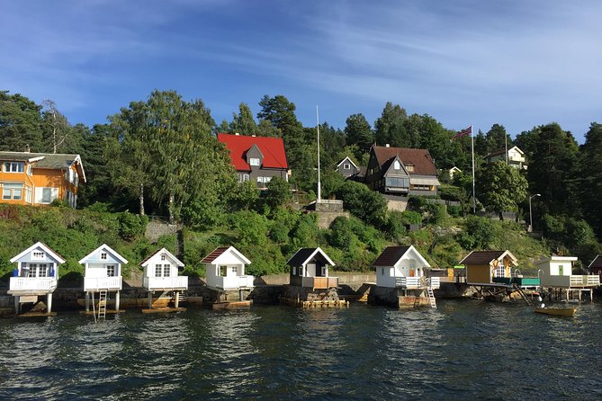 Oslo Combo Tour: Grand City Tour and Oslo Fjord Cruise - Walking through Vigeland Park