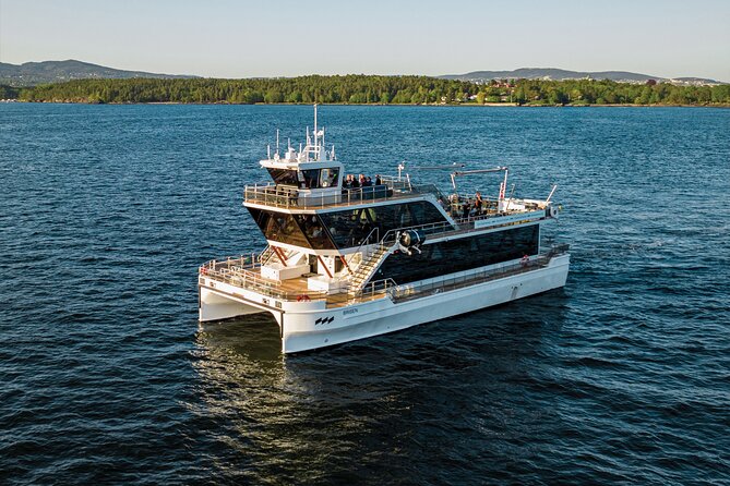 Oslo fjord 3-Course Dinner Cruise with Live Music - Returning past the Opera House and Aker Fortress