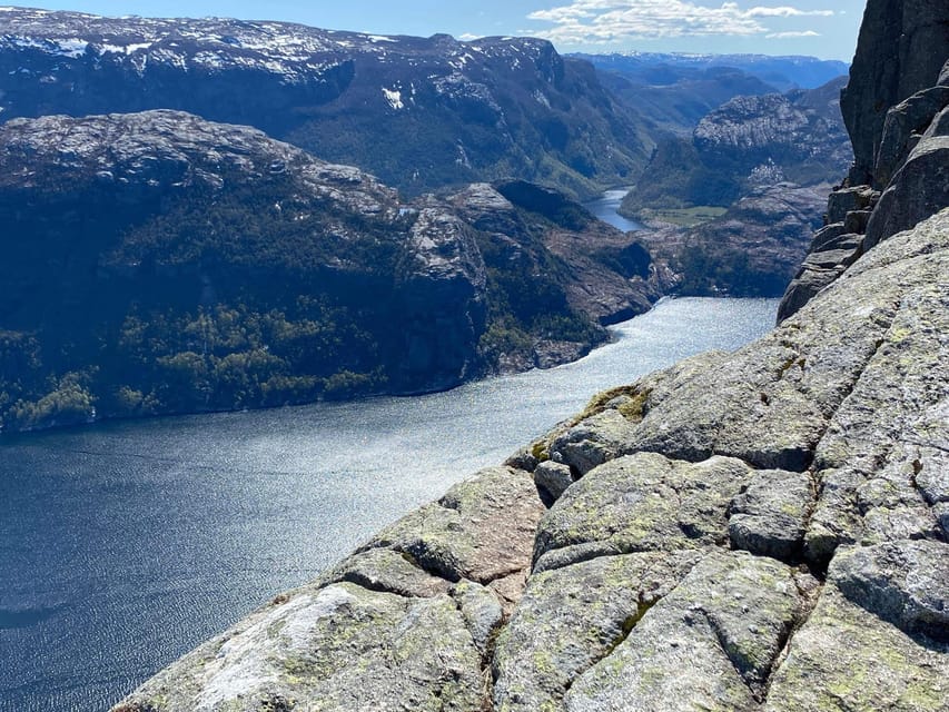Stavanger: Preikestolen Tour with Guide and Pickup - Reaching the flat top above Lysefjord