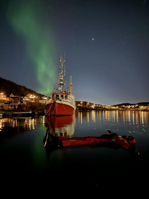 Tromsø: Arctic Fjord Floating in Survival Suit - Drying off, waffles, and the diploma