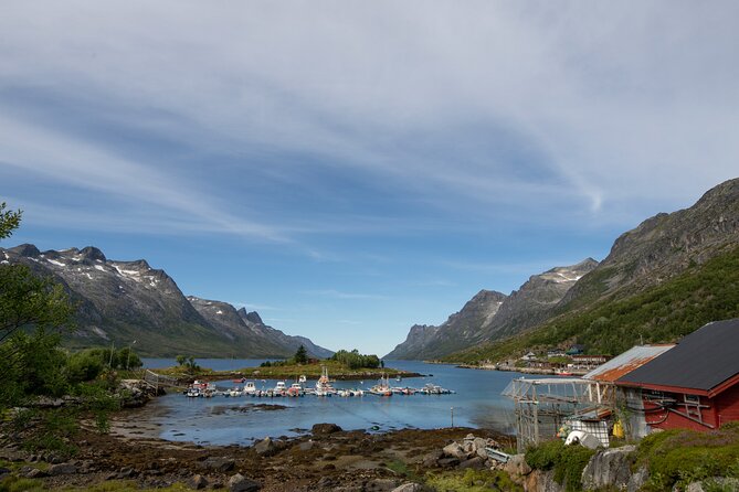 Tromso fjords road trip with fire in grill cabin by the beach. - The view toward Håkøya and Tirpitz