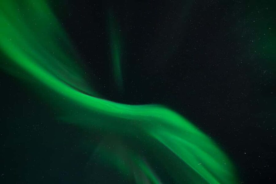 Tromsø: Northern Lights Focus Tour, German/English, minibus, meal - Stop one: reading the sky across Troms County