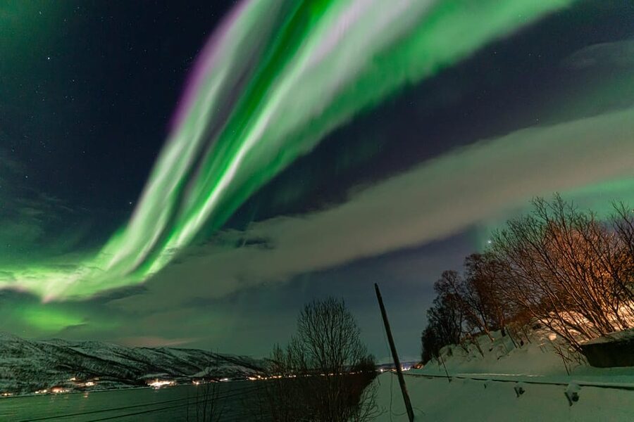 Tromsø: Northern Lights Tour w/Photo, Suits and Local Guide - Warm suits, hot drinks, and sausages