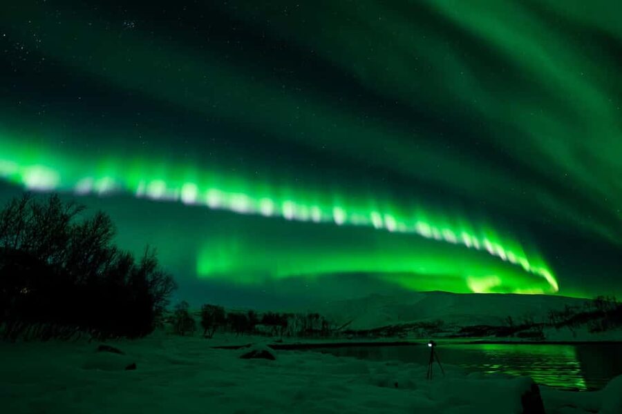 Tromsø: Northern Lights Tour with Guaranteed Sightings - Finding a dark patch along the fjord