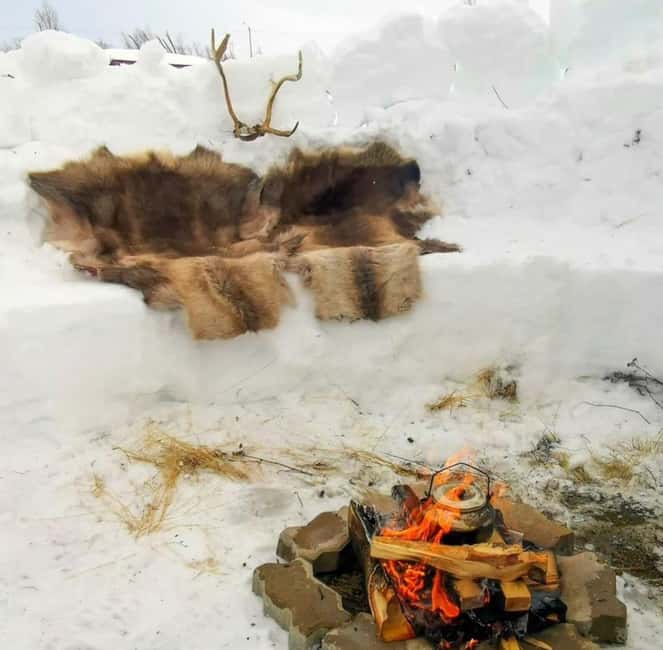 Tromsø: Snow Sledding, Mini Skiing, Lasso and Reindeer Hides - Hot drinks, snacks, and a fire by the hut